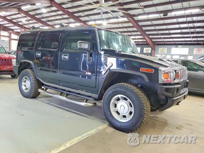Czwarte zdjęcie samochodu z boku: 2006 HUMMER H2 VIN:5GRGN23U06H119962 - miniatura