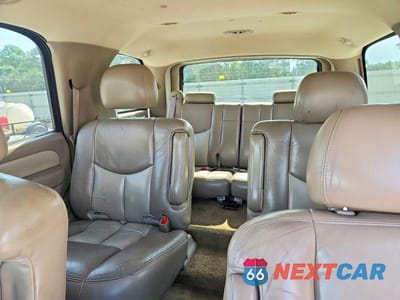 Zdjęcie 10 z 13 samochodu: 2003 GMC YUKON DENALI VIN:1GKEK63U13J246236 - miniatura