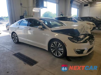Czwarte zdjęcie samochodu z boku: 2019 LINCOLN MKZ RESERVE II VIN:3LN6L5MU9KR622252 - miniatura