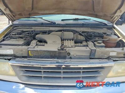 Zdjęcie 12 z 13 samochodu: 2003 FORD ECONOLINE E350 SUPER DUTY WAGON VIN:1FBSS31L43HA53257 - miniatura