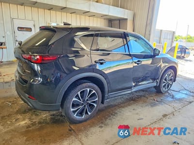 Trzecie zdjęcie samochodu z tyłu: 2023 MAZDA CX-5 PREMIUM VIN:JM3KFBDM6P0240624 - miniatura