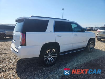 Trzecie zdjęcie samochodu z tyłu: 2018 GMC YUKON SLE VIN:1GKS2AKCXJR386959 - miniatura