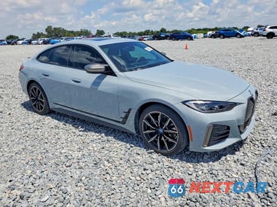 Czwarte zdjęcie samochodu z boku: 2024 BMW I4 M50 VIN:WBY33AW01RFS33055 - miniatura
