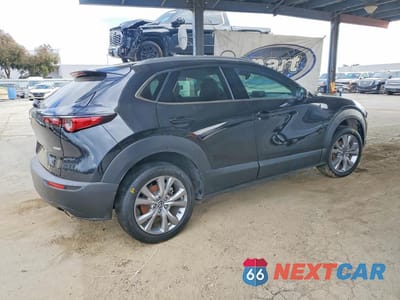 Trzecie zdjęcie samochodu z tyłu: 2022 MAZDA CX-30 PREMIUM VIN:3MVDMBDL7NM443738 - miniatura