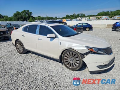Czwarte zdjęcie samochodu z boku: 2013 LINCOLN MKS VIN:1LNHL9DK6DG601111 - miniatura