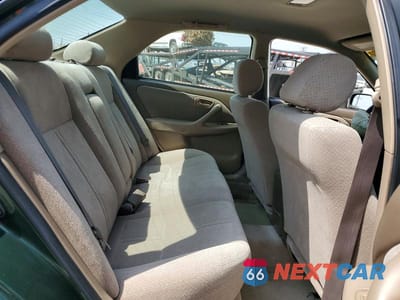Zdjęcie 10 z 12 samochodu: 2000 TOYOTA CAMRY LE VIN:JT2BG22K1Y0506357 - miniatura