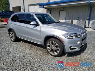 Czwarte zdjęcie samochodu z boku: 2014 BMW X5 SDRIVE35I VIN:5UXKR2C58E0H33262 - miniatura