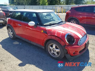 Czwarte zdjęcie samochodu z boku: 2007 MINI COOPER VIN:WMWMF33537TU62387 - miniatura