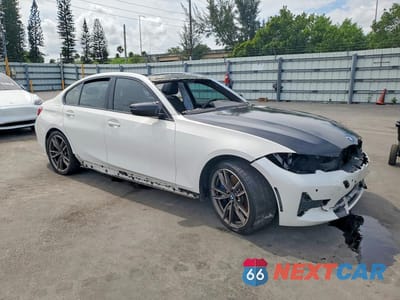 Czwarte zdjęcie samochodu z boku: 2021 BMW M340I VIN:3MW5U7J00M8B90862 - miniatura