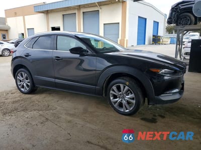Czwarte zdjęcie samochodu z boku: 2022 MAZDA CX-30 PREMIUM VIN:3MVDMBDL7NM443738 - miniatura