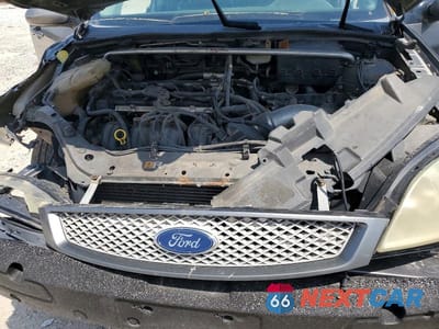 Zdjęcie 11 z 13 samochodu: 2005 FORD FOCUS VIN:1FAFP38Z95W132632 - miniatura