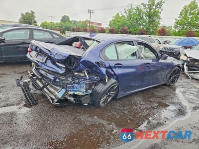 Trzecie zdjęcie samochodu z tyłu: 2022 BMW 330XE VIN:WBA5P9C04NFM09489 - miniatura