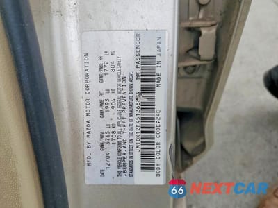 Zdjęcie 12 z 12 samochodu: 2005 MAZDA 3 I VIN:JM1BK12F451268884 - miniatura