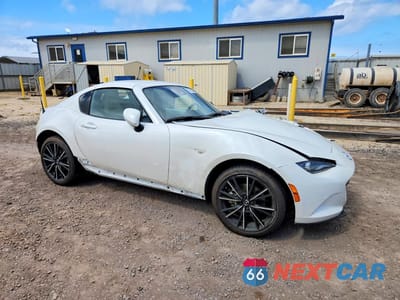 Czwarte zdjęcie samochodu z boku: 2025 MAZDA MX-5 MIATA GRAND TOURING VIN:JM1NDAM73S0656946 - miniatura