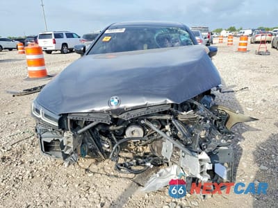 Piąte zdjęcie samochodu w środku: 2022 BMW 540 I VIN:WBA53BJ00NCJ34369 - miniatura