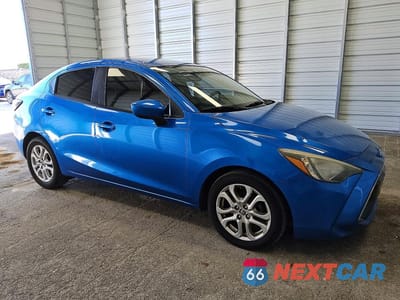 Czwarte zdjęcie samochodu z boku: 2017 TOYOTA YARIS IA BASE VIN:3MYDLBYV0HY196254 - miniatura