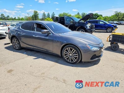 Czwarte zdjęcie samochodu z boku: 2015 MASERATI GHIBLI S VIN:ZAM57RTA7F1134643 - miniatura