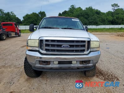 Piąte zdjęcie samochodu w środku: 2003 FORD F250 4WD VIN:1FTNW21L43EC73653 - miniatura