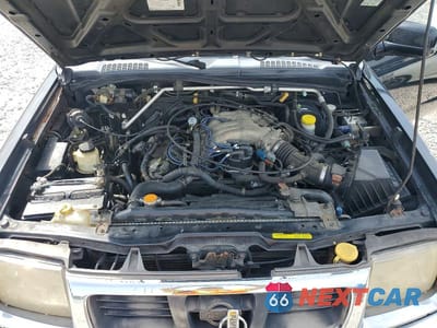 Zdjęcie 11 z 12 samochodu: 2000 NISSAN FRONTIER XE DESERT RUNNER VIN:1N6ED26T8YC394376 - miniatura