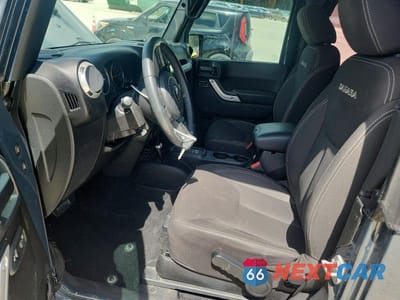 Zdjęcie 7 z 13 samochodu: 2017 JEEP WRANGLER SAHARA VIN:1C4AJWBG1HL517512 - miniatura