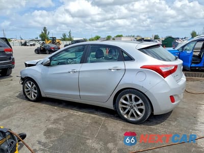 Drugie zdjęcie samochodu z przodu: 2013 HYUNDAI ELANTRA GT BASE VIN:KMHD35LE9DU049253 - miniatura