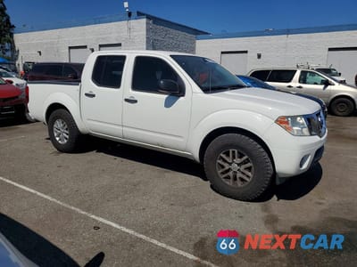 Czwarte zdjęcie samochodu z boku: 2019 NISSAN FRONTIER SV VIN:1N6AD0ER2KN711587 - miniatura