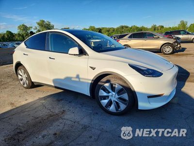 Czwarte zdjęcie samochodu z boku: 2023 TESLA MODEL Y VIN:7SAYGDEE1PA202285 - miniatura