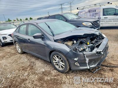 Czwarte zdjęcie samochodu z boku: 2018 FORD FOCUS SE VIN:1FADP3F22JL292070 - miniatura