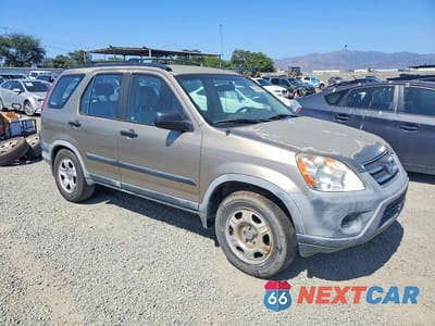 Czwarte zdjęcie samochodu z boku: 2006 HONDA CR-V LX VIN:JHLRD68556C005364 - miniatura