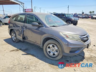Czwarte zdjęcie samochodu z boku: 2015 HONDA CR-V LX VIN:5J6RM3H3XFL003274 - miniatura