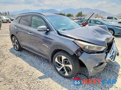 Czwarte zdjęcie samochodu z boku: 2016 HYUNDAI TUCSON LIMITED VIN:KM8J33A29GU180672 - miniatura