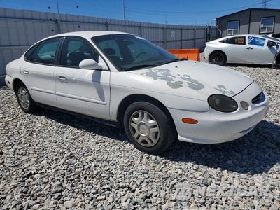 Czwarte zdjęcie samochodu z boku: 1999 FORD TAURUS SE VIN:1FAFP53U1XA316258 - miniatura