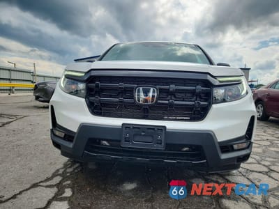 Piąte zdjęcie samochodu w środku: 2025 HONDA RIDGELINE BLACK EDITION VIN:5FPYK3F86SB027663 - miniatura