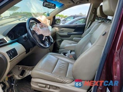 Zdjęcie 7 z 13 samochodu: 2012 HONDA ODYSSEY EXL VIN:5FNRL5H60CB083052 - miniatura
