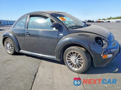 Czwarte zdjęcie samochodu z boku: 1999 VOLKSWAGEN NEW BEETLE GL VIN:3VWBC21C5XM443513 - miniatura