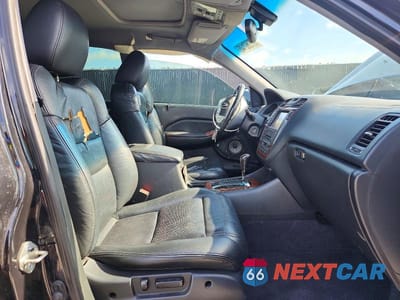 Zdjęcie 7 z 13 samochodu: 2004 ACURA MDX TOURING VIN:2HNYD18854H529401 - miniatura