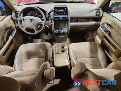Zdjęcie 8 z 13 samochodu: 2004 HONDA CR-V LX VIN:JHLRD78474C037937 - miniatura