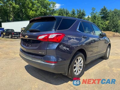 Czwarte zdjęcie samochodu z boku: 2019 CHEVROLET EQUINOX LT VIN:3GNAXUEV4KL254562 - miniatura