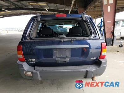 Zdjęcie 6 z 13 samochodu: 2004 JEEP GRAND CHEROKEE LAREDO VIN:1J4GW48N04C373591 - miniatura