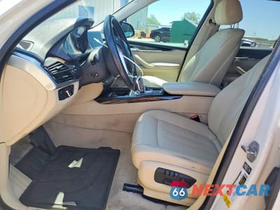 Zdjęcie 7 z 12 samochodu: 2014 BMW X5 SDRIVE35I VIN:5UXKR2C55E0C00396 - miniatura