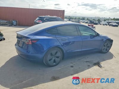 Trzecie zdjęcie samochodu z tyłu: 2021 TESLA MODEL 3 VIN:5YJ3E1EB8MF855907 - miniatura