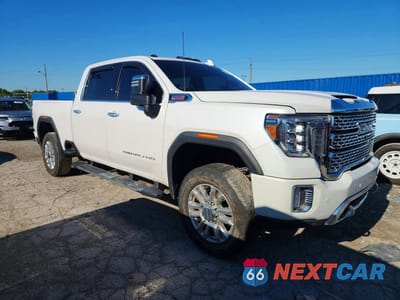 Czwarte zdjęcie samochodu z boku: 2021 GMC SIERRA K2500 DENALI VIN:1GT49REY7MF187749 - miniatura
