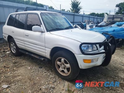 Czwarte zdjęcie samochodu z boku: 2000 TOYOTA RAV4 BASE VIN:JT3HP10V6Y7168698 - miniatura