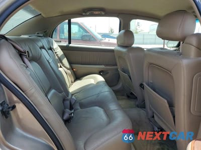 Zdjęcie 10 z 12 samochodu: 2000 BUICK PARK AVENUE VIN:1G4CW54K7Y4227772 - miniatura