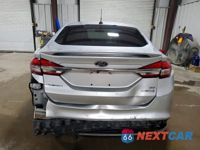 Zdjęcie 6 z 12 samochodu: 2018 FORD FUSION SE HYBRID VIN:3FA6P0LU7JR155821 - miniatura