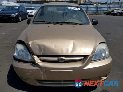 Piąte zdjęcie samochodu w środku: 2005 KIA RIO BASE VIN:KNADC125556399027 - miniatura