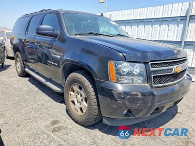 Czwarte zdjęcie samochodu z boku: 2011 CHEVROLET SUBURBAN C1500 LT VIN:1GNSCJE05BR359736 - miniatura