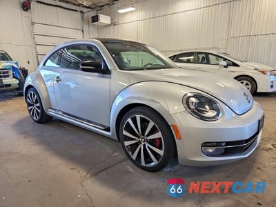 Czwarte zdjęcie samochodu z boku: 2012 VOLKSWAGEN BEETLE TURBO VIN:3VWVA7AT9CM630246 - miniatura
