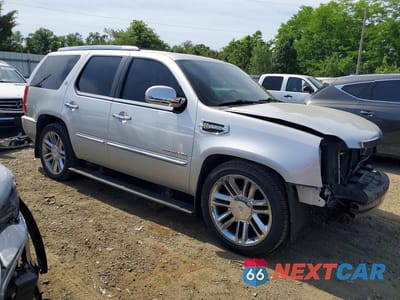 Czwarte zdjęcie samochodu z boku: 2010 CADILLAC ESCALADE PLATINUM HYBRID VIN:1GYUKFEJ3AR199004 - miniatura