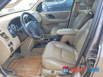 Zdjęcie 7 z 13 samochodu: 2003 FORD ESCAPE LIMITED VIN:1FMCU94193KE08316 - miniatura